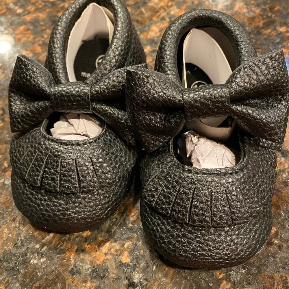 Baby Girl moccasins. Brand new ! Size 12